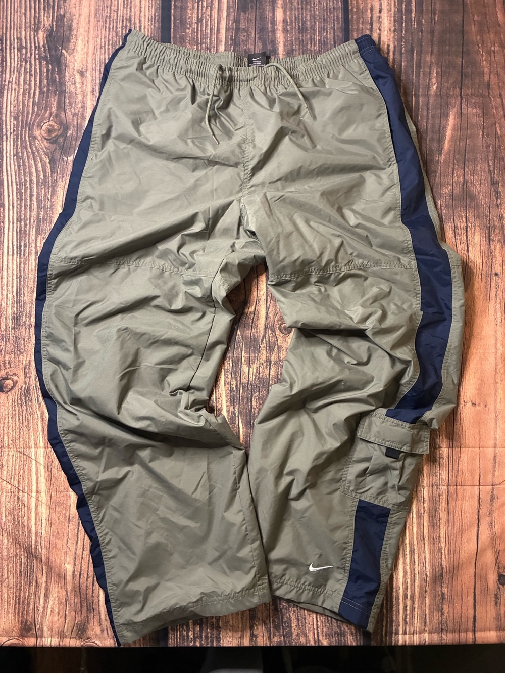Nike Men's Olive Green Track Pants with Navy Side Panels size L